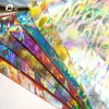 Wholesale of new 0.6mm Iride-colored laser series pu leather spunlace bottom fabric for luggage, stationery and packaging leather fabric Specification image
